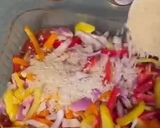 A picture of step 3 of One Pan Spicy Chicken, Veggie and Rice Bake.