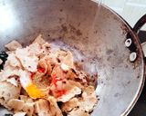A picture of step 4 of Seyal phulka (leftover rotis in garlic tomato curry).
