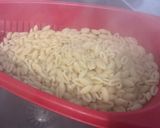 Une image de l'étape 7 de Gratin de gnochettis aux épinards, lard et tomates.