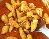 A picture of step 4 of Baby corn masala curry.