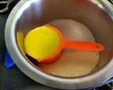 A picture of step 1 of Mango Sooji Cake.