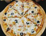 A picture of step 6 of Creamy Sauce Pizza 🍕🍕.