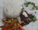 A picture of step 9 of Teragon steaks with garlic rice and vegs.