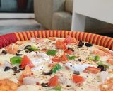 A picture of step 5 of Cheesy pan pizza.
