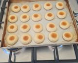 A picture of step 10 of Jam Thumbprint Cookies.