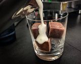 A picture of step 2 of Chocolate milk ice cubes with frothed milk [Ideal for kids].