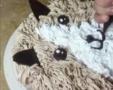A picture of step 11 of Chocolate theme cake.