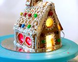A picture of step 4 of “Eggless Gingerbread House” with icing.