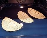 A picture of step 5 of Stuffed Garlic bread sticks without Yeast.