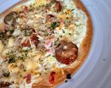 Une image de l'étape 4 de Pizzas 🍕 wraps aux lardons et saucisses fumées.