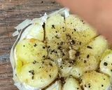A picture of step 1 of The ABSOLUTE BEST Roasted Garlic Cheese Bread 🥖.