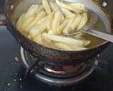 A picture of step 5 of Peri Peri French fries 🍟.