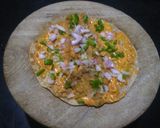 A picture of step 4 of Schezwan aloo roll.