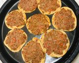 A picture of step 3 of Sfiha with Tomato and Tahini.