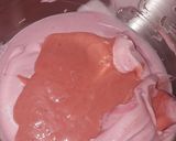 A picture of step 5 of Strawberry milk cake with whipped cream frosting.