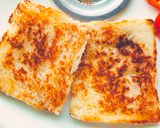 A picture of step 3 of Tomato toast sandwich.