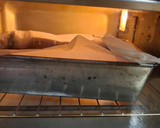 Foto del paso 4 de la receta: Budín de pan con almendras y arándanos