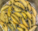 A picture of step 5 of Baked Spiced potato wedges with garlic Bechamel sauce.
