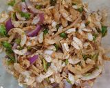 A picture of step 4 of Poha onion triangle samosa.