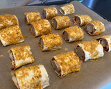 Foto del paso 9 de la receta: Hojaldrinas de salchicha y queso rebozadas en maíz frito