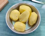 Foto del paso 4 de la receta Muslos de pollo con patatas en el pizzapan