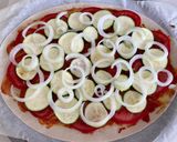 Une image de l'étape 3 de Tarte fine aux tomates courgettes et oignons.