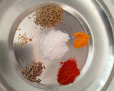 A picture of step 1 of Matar masala.