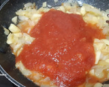 Foto del paso 3 de la receta: Calabacín relleno de bacalao con tomate