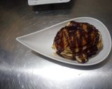 A picture of step 1 of Pancake with chocolate syrup.