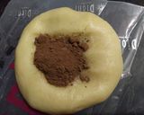 A picture of step 6 of Swiss roll tutti frutti cookies.