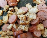 A picture of step 6 of My Smoked Sausage Garlic Chicken & a Veg Rice.