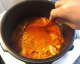Foto del paso 7 de la receta: Fideuá melosa de pollo con pimientos