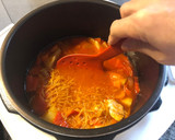 Foto del paso 7 de la receta: Fideuá melosa de pollo con pimientos