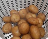 A picture of step 1 of Nepali style Aloo Dum with Chiwda /Poha/ Flattened rice.