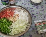 A picture of step 2 of Maggi Nutrilicious Masala VEG ATTA noodles Vegetables pizza.