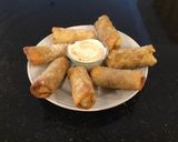 A picture of step 9 of Tuscan Beef Shortrib Egg rolls.