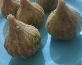 A picture of step 5 of Apple cinnamon Modak.
