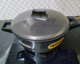 A picture of step 6 of Basanti Pulao.