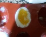 A picture of step 11 of Kunafa and Qashtalia Decorated with Oranges, Strawberries, and Bananas.