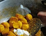 A picture of step 5 of Masala baby potatoes.