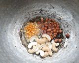 A picture of step 2 of Mamidikaya pulihora or mavinakayi chitrana / Mango rice.