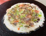 A picture of step 3 of Arabic bread egg sandwich.