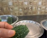 A picture of step 1 of Bharwa Karela Sabzi.