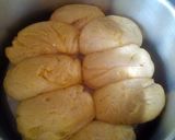 A picture of step 10 of Mini buns using charcoal jiko.