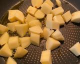 A picture of step 2 of Mochar ghonto (banana flower curry).