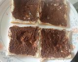 A picture of step 4 of Nutella banana Swiss rolls.
