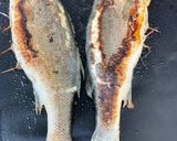 Une image de l'étape 6 de Bars farcis oseille, persil, ail et oignon grillés à la plancha.