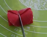 A picture of step 7 of Two-style fondant rose.