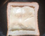 A picture of step 6 of Cheesy Egg Toast.
