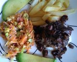 Foto del paso 9 de la receta: Manto de calamares en su tinta sobre arroz blanco